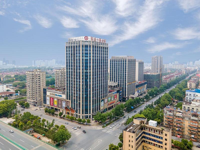 Vienna International Hotel Jiujiang Shili Street Buitenkant foto